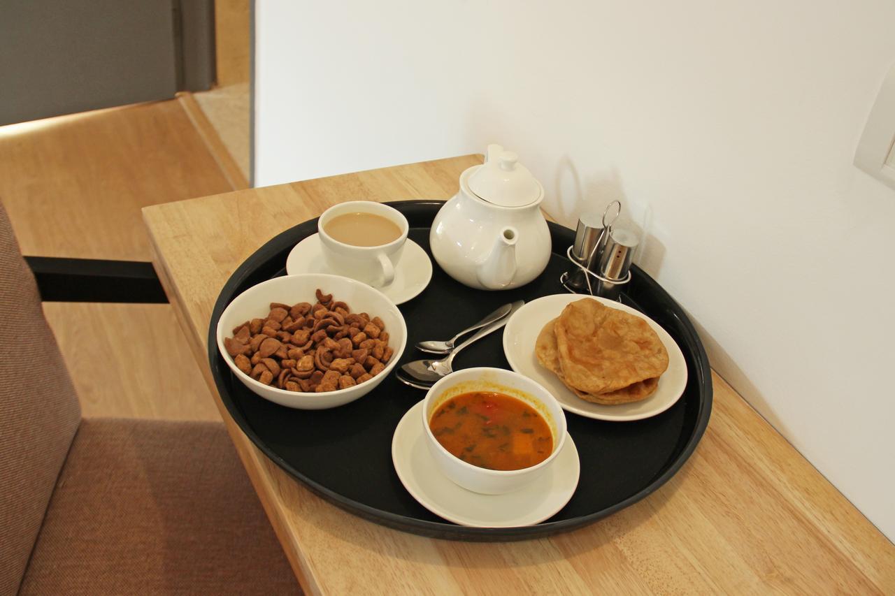 Oyo 11392 The Hotel Grand Hospitality Noida Extérieur photo